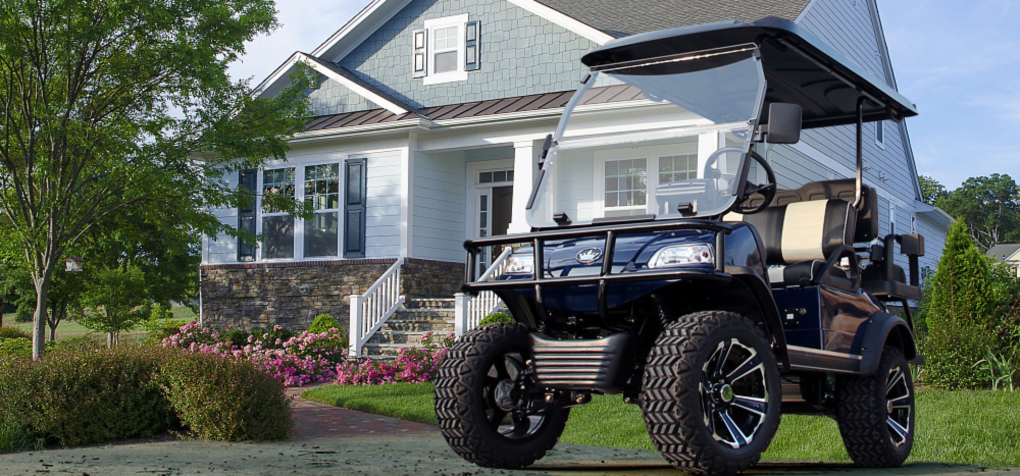 Golf cart in front of a family house